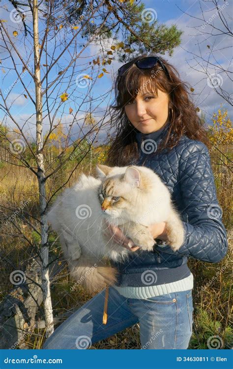 Young Woman And Siberian Cat In A Autumn Forest Stock Image Image Of