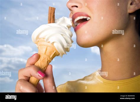 Woman Eating Ice Cream Stock Photo Alamy