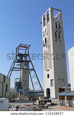 The steel and concrete structure of the headgear of a gold mine in ...