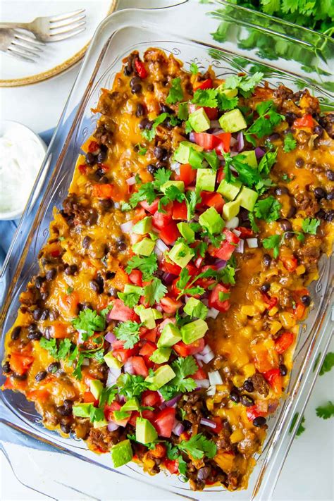 This Easy Taco Casserole Recipe Is The Best Comfort Food With Tortillas Ground Beef Beans And