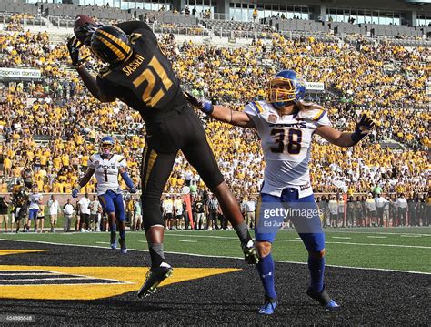 Bud Sasser Of The Missouri Tigers Catches A Touchdown Pass Against