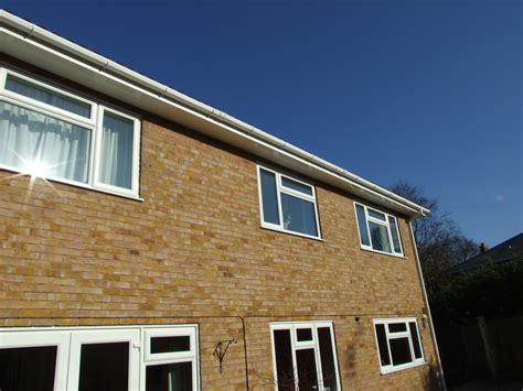 Installation Of White UPVC Fascias Soffits And Square PVC Guttering To