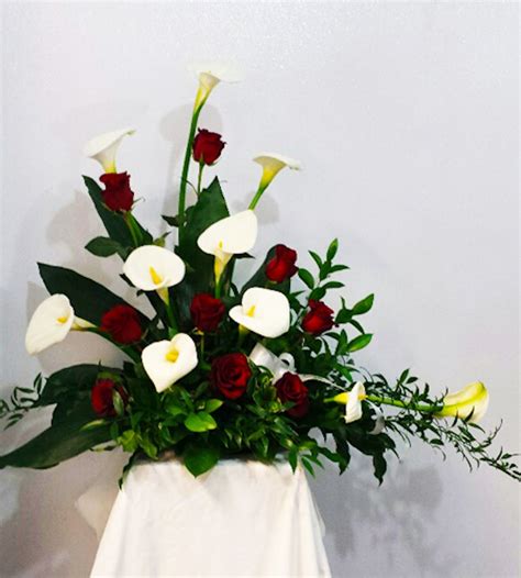 Rose And Calla Lily Funeral Arrangement In Minneapolis Mn Schaaf Floral