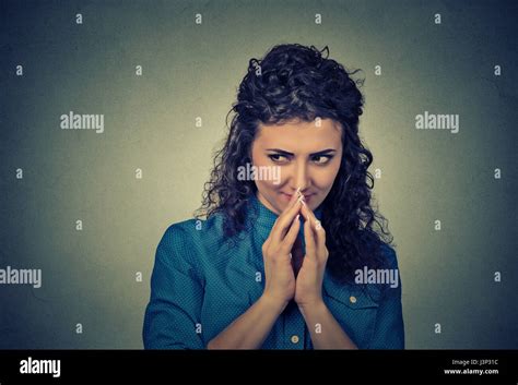 Closeup Portrait Of Sneaky Sly Scheming Young Woman Plotting