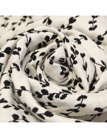 Jacquard Feuillage fond noir blanc cassé vendu au mètre