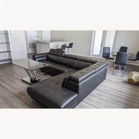 Rooms To Go Black Leather Sectional - AptDeco