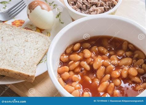 Baked Beans In Tomato Sauce On Bowl With Bread And Tuna Steak Stock