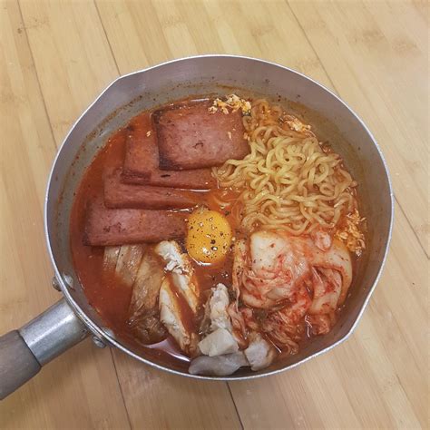 Homemade Shin Ramen With Kimchi Spam Chicken And Egg Yolk Food