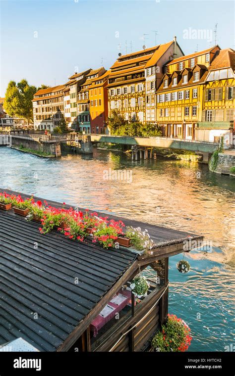 Historic Half Timbered Buildings On The Baks Of River Ill Seen From