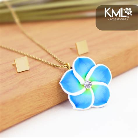 Set Dorado Flor Azul Kml Accesorios