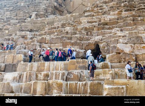 Tourists gather at the entrance to the Great Pyramid of Cheops (Khufu ...