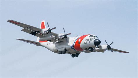 United States Coast Guard C130, Kodiak 1711 - Short Final in Homer, Alaska Photograph by Timothy ...