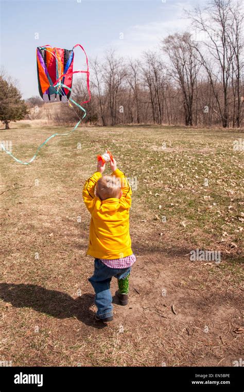 Boy Flying Kite Stock Photo Alamy