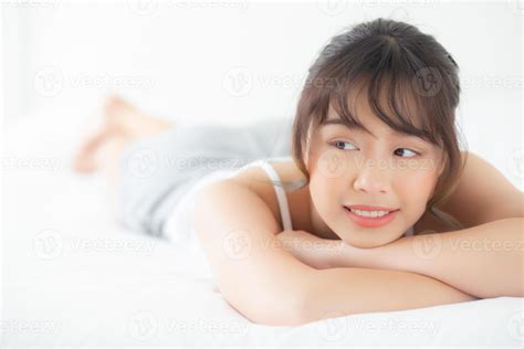 Beautiful Portrait Young Asian Woman Lying And Smile While Wake Up With