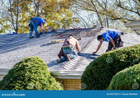 Workers Repairing The Roof Of A Home Editorial Image Image Of