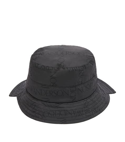 Mens Jw Anderson Black Asymmetric Logo Bucket Hat Harrods Uk