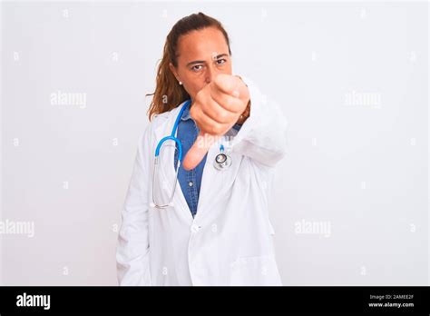 Middle Age Mature Doctor Woman Wearing Stethoscope Over Isolated