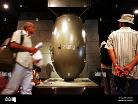 Visitors Look At A Replica Of The 45 Ton Atomic Bomb Fat Man At The