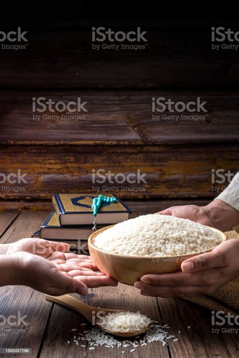 Hands Are Holding A Pile Of Grain To Zakat The Islamic Zakat Concept