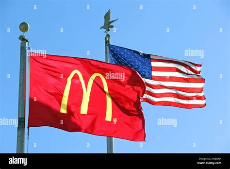 US flag and McDonalds flag over a McDonalds restaurant on the US Naval Station Guantanamo Bay ...