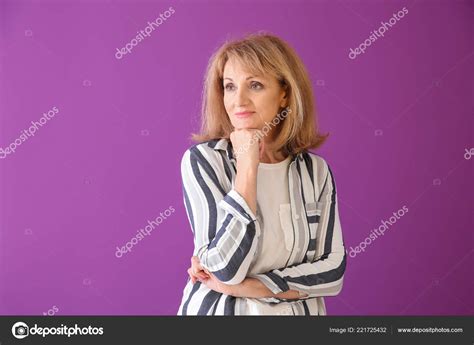 Portrait Thoughtful Mature Woman Color Background Stock Photo By
