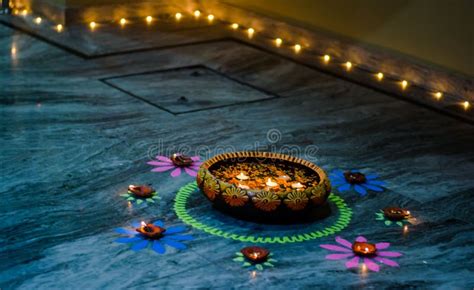 Happy Diwali - Colorful Clay Diya Lamps Lit during Diwali Celebration Stock Photo - Image of ...