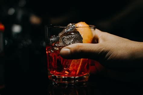 Hand Holding Cocktail In Glass Stock Photo At Vecteezy