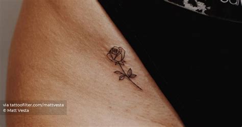 Fine Line Rose Tattoo On The Pelvis