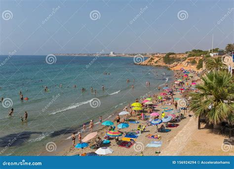 Punta Prima Costa Blanca Spain with Sunbathers and Parasols Editorial ...