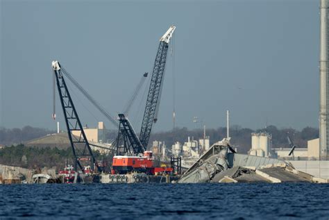 Cranes Start To Arrive To Remove Baltimore Bridge Wreckage Pbs News