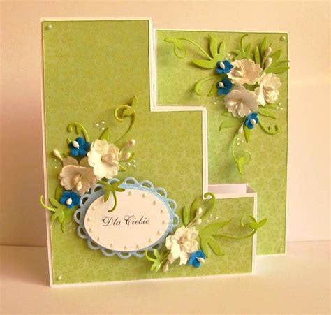 A Handmade Card With Flowers On The Front And Bottom Which Is