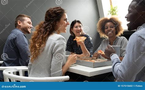 Cheerful Multiracial Business Team People Having Fun Eating Pizza