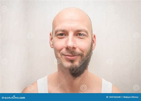 A Man`s Face With A Full Beard And No Beard Portrait Of A Bald Young