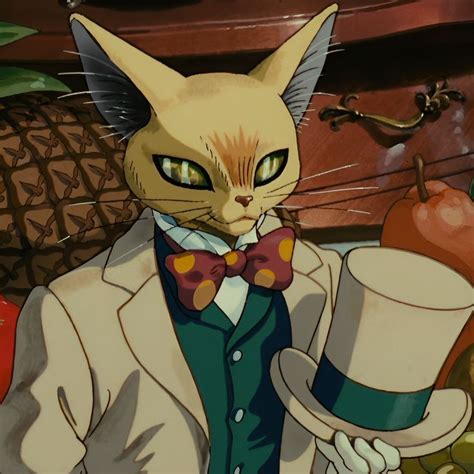 A Cat Wearing A Suit And Bow Tie Holding A Cup In Front Of Some Fruit