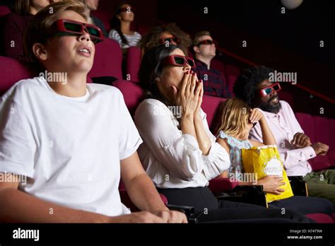 Audience In Cinema Wearing 3d Glasses Watching Horror Film Stock Photo