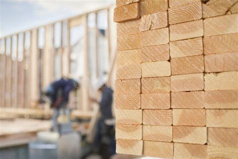 Stacked Lumber And Blueprints At A Construction Si Stock Image Image