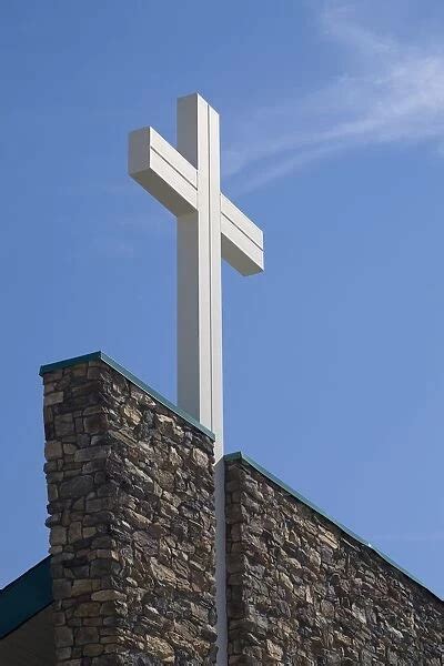 White Cross On Top Of A Stone Church Wall Crossfield