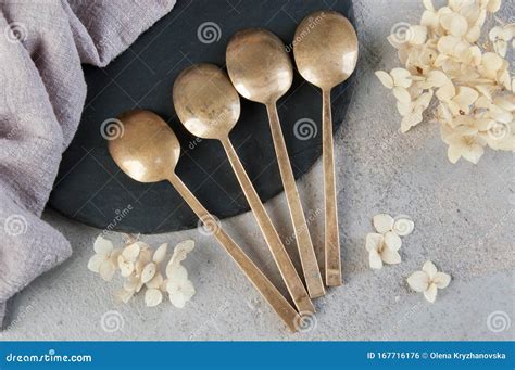 Old Bronze Tea Spoons On Concrete Stock Photo Image Of Shabby Space