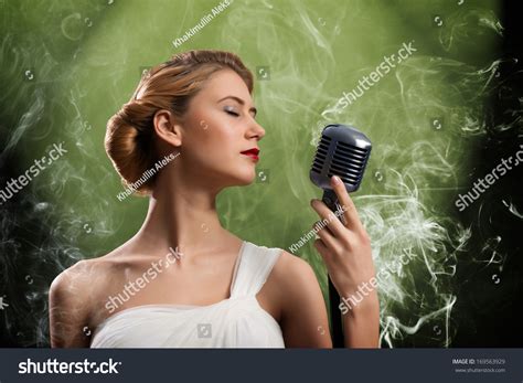 Beautiful Blonde Woman Singer Microphone Eyes Stock Photo 169563929 Shutterstock