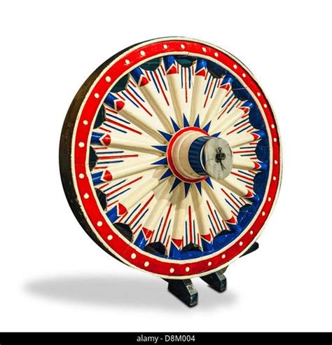 A Restoredwooden Hand Carvedcircus Wagon Wheel Stock Photo