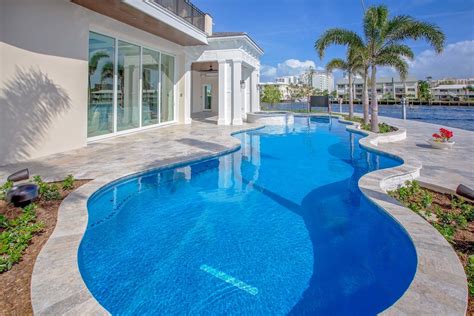 Silver Travertine Pavers Rustic Pool Miami By Stonehardscapes