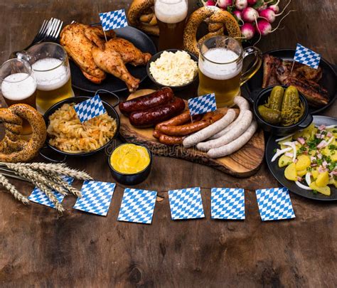 Oktoberfest Dishes With Beer Pretzel And Sausage Stock Photo Image