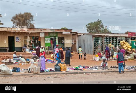 People At Third World Corrugated Iron Shacks And Roadside Shops Duka