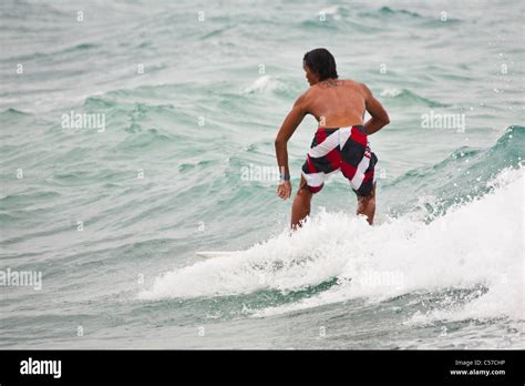 Local Is Surfing At A Beach On The Island Of Bohol Philippines Stock