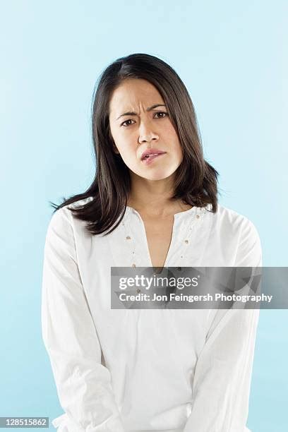 Biting Lip Nervous Photos And Premium High Res Pictures Getty Images