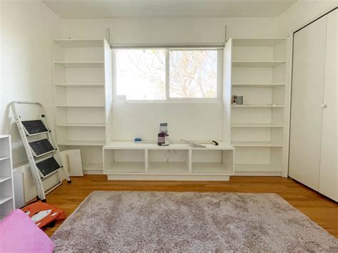 Ikea Hack Diy Built In Bookshelves With A Window Seat Ikea Window Seat Ikea Bookshelves