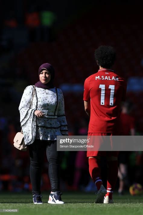 Mohamed Salah Of Liverpool Walks Towards His Wife Magi After The