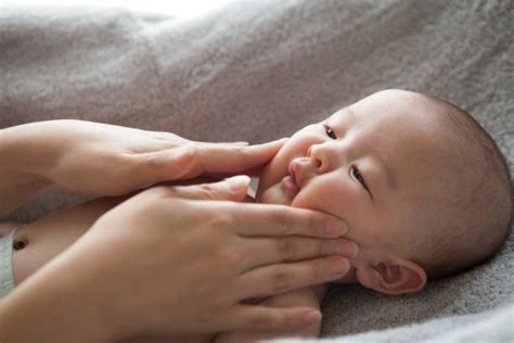 Baby Face Massage Stock Photos Pictures And Royalty Free Images Istock