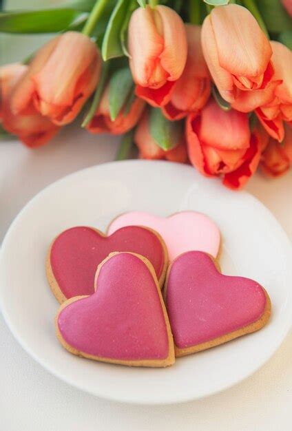 Premium Photo Decorated Heart Shaped Cookie On White