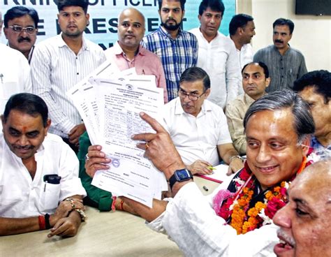 Senior Congress Leader And Mp Shashi Tharoor Shows Nomination Papers